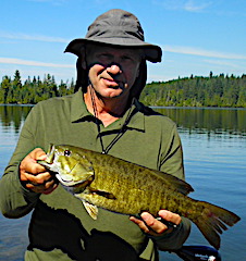 Many Trophy Smallmouth Bass Fishing by Steve at Fireside Lodge in Canada